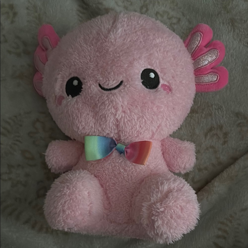 Pink Plush Toy with Rainbow Bow